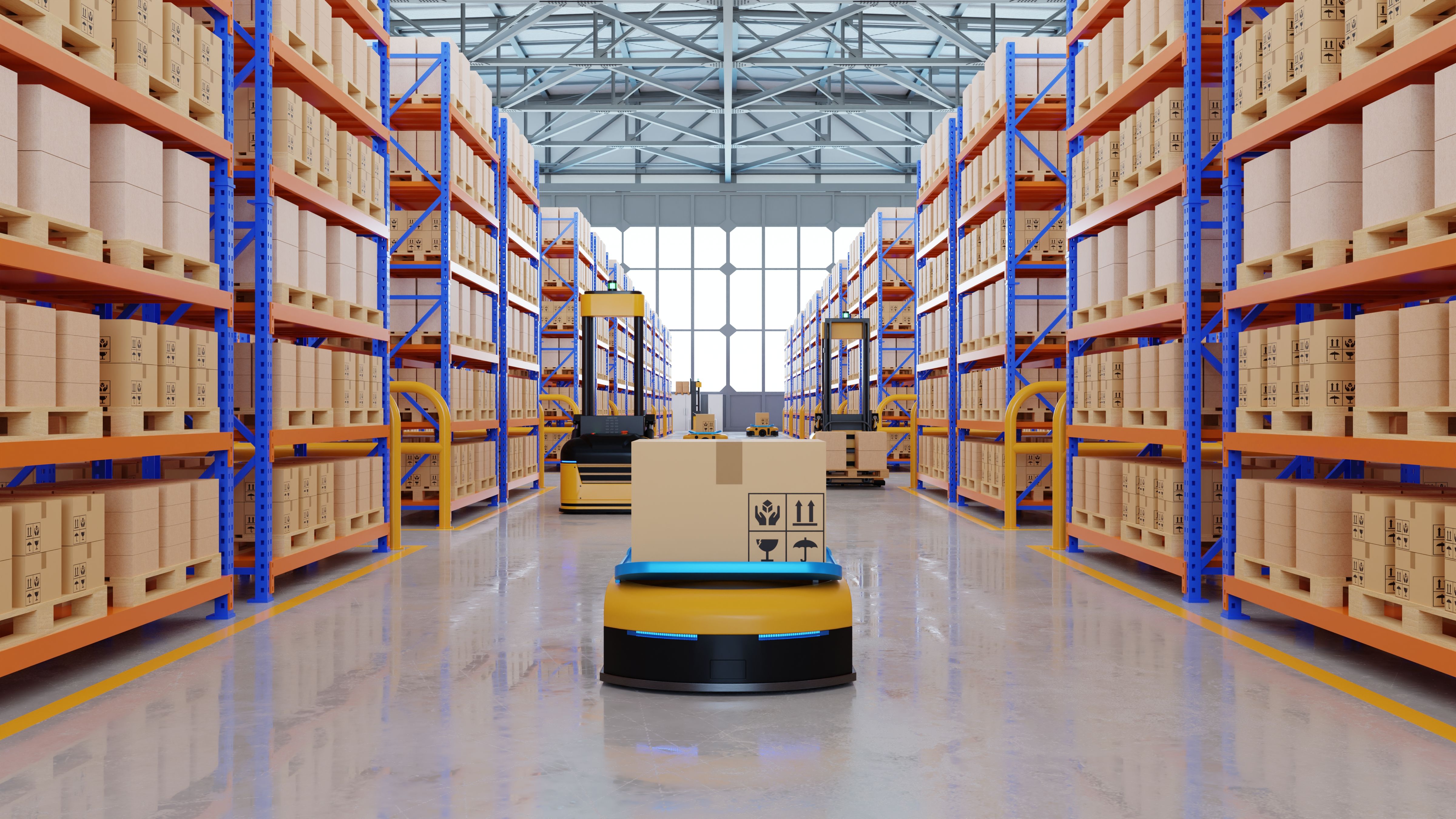 AGV in a modern warehouse sitting in between two rows of pallet racks
