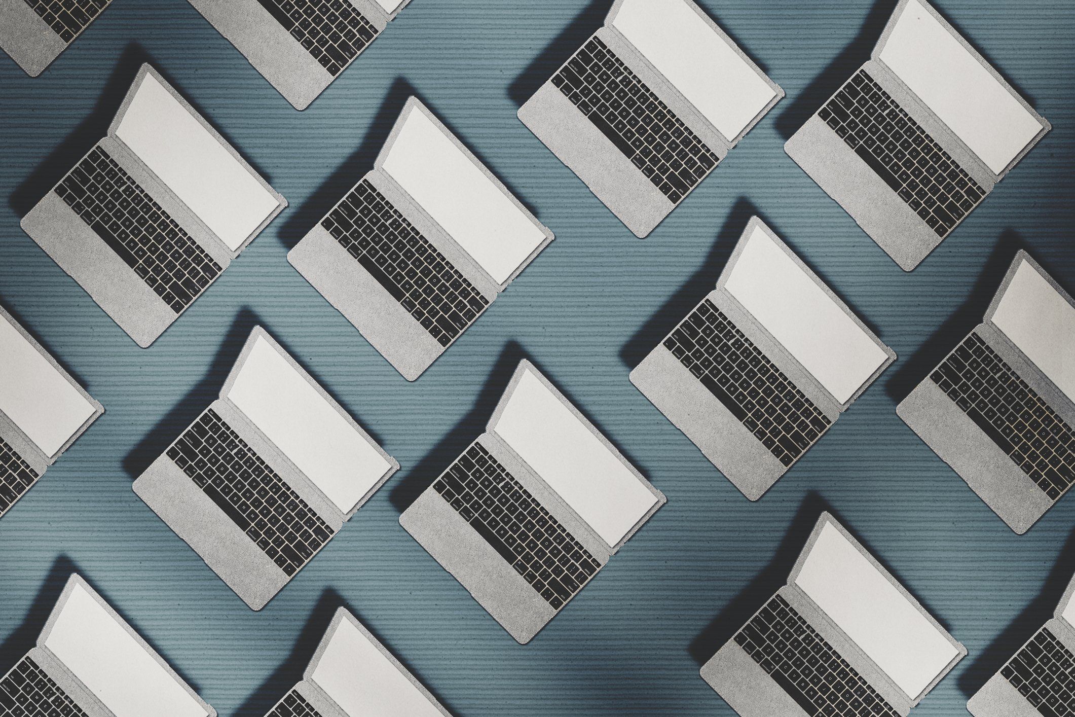 An abstract of a group of laptops shot from birdseye